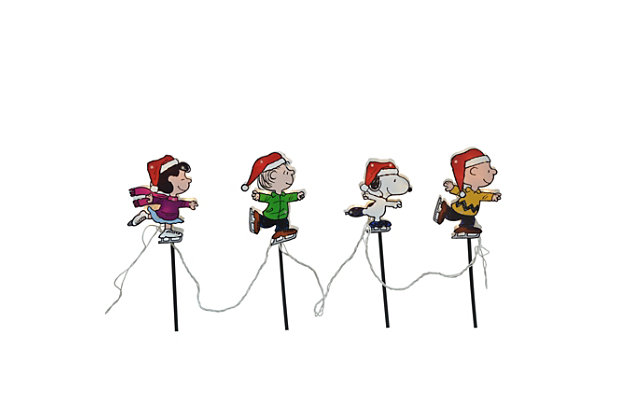 Guide your yuletide guests and proudly show off your Christmas spirit with the ProductWorks 8-Inch pre-lit Peanuts skating Christmas pathway markers. These officially licensed light-up pathway markers feature lovable Peanuts characters Charlie Brown, Linus, Lucy, and Snoopy. Mount them into the ground with the included 4-inch stakes, or hang them indoors with the suction cup hangers. Let these classic and beloved characters lead you to a place of pure happiness this Christmas season. With 25 clear mini lights within, you and your guests will always be able to find your way. The sturdy construction will preserve this charming addition to your Christmas decorations season after season, while the narrow profile makes it easy to store when not in use. The bright, vibrant colors of each character will bring a healthy helping of holiday cheer to any home or yard. Includes 4 pathway markers, 4 ground stakes, and 4 suction cup hangers. Made of plastic | Includes 4 pathway markers, 4 ground stakes, and 4 suction cup hangers | Power source type: corded electric | Overall height measures 22" tall; icons are 8" tall; stakes are 14" tall | Assembly required