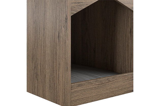 Your feline friend will have their own spot to lounge around all day with the Ollie & Hutch Roscoe Cat House End Table. Made of laminated particleboard, the brown woodgrain finish will look great with any style and features a gray microfiber cushion so your cat can snooze away right by your side. The End Table offers an open cubby for you to organize electronics and reading material. The tabletop is perfect for a reading lamp and to hold snacks and electronics while watching your favorite shows and movies. The Cat House End Table ships flat to your door and requires assembly upon opening. Two adults are recommended to assemble. Once assembled, the End Table measures to be 24.06”H x 15.79”W x 20.04”D.Give your cat the perfect spot for a cat nap with the ollie & hutch roscoe cat house end table | Made of laminated particleboard with a brown woodgrain finish, the end table offers a gray microfiber cushion | The open cubby and tabletop can organize all of your electronics, reading material, and snacks | The cat house end table ships flat to your door and 2 adults are recommended to assemble. The tabletop and cat house can each hold 50 lbs. While the cubby can hold 20 lbs. Assembled dimensions: 24.06”h x 15.79”w x 20.04”d | 1 year limited warranty is included