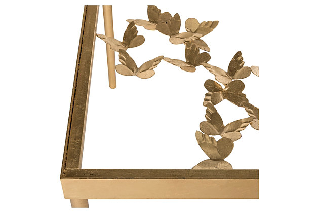 Bring an easy-breezy sense of elegance to your living space with the exquisite Rosalia Butterfly coffee table. Graceful yet sturdy metal frame is adorned with an antiqued goldtone finish that’s aged to perfection. Clear glass tabletop adds to the butterflies’ floating-on-air quality.Made of iron with goldtone finish | Clear glass tabletop | Clean with a soft, dry cloth; spray small amount of glass cleaner onto lint-free cloth and wipe mirror/glass clean | Assembly required