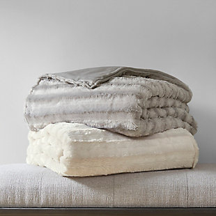 Sleep soundly with weighted comfort of the Beautyrest Duke Faux Fur Weighted Blanket. Designed for adults or those with a minimum body weight of 120lbs, this 60”x70” weighted blanket provides all-over comforting pressure to make you feel secure and relaxed. The ivory faux fur cover comes with a weighted insert that has box quilting to prevent the polyester and glass bead filling from shifting. Ten inner ties and a zipper closure on the faux fur blanket cover keep the insert secure. The cover itself is machine washable for easy care, while the insert needs to be spot cleaned. Perfect for your bed or lounging on the couch, this weighted blanket helps promote a comfortable and anxiety free sleep throughout the night. Available in 12lb and 18lb weights.Imported | Provides all over body comforting pressure, ma you feel secure and relaxed | Beautyrest faux fur weighted blanket 60"x70" inches designed for adults or minimum body weight of 120 lbs or more | Two polyester filling layers to prevent in-between beads from shifting | Promotes a deep and restful sleep throughout the night | Removable faux fur cover zipper closure is machine washable for easy care | Weighted insert is box quilted to secure filling from shifting | 10 inside ties efficiently stay put the weighted insert