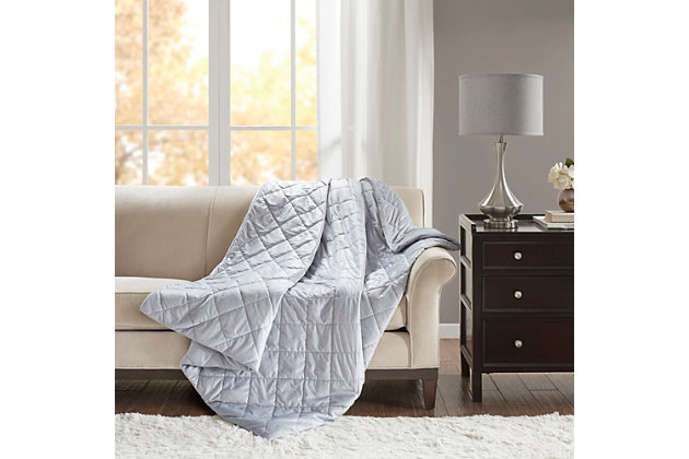 Sleep soundly with weighted comfort of the Beautyrest Duke Faux Fur Weighted Blanket. Designed for adults or those with a minimum body weight of 120lbs, this 60”x70” weighted blanket provides all-over comforting pressure to make you feel secure and relaxed. The grey faux fur cover comes with a weighted insert that has box quilting to prevent the polyester and glass bead filling from shifting. Ten inner ties and a zipper closure on the faux fur blanket cover keep the insert secure. The cover itself is machine washable for easy care, while the insert needs to be spot cleaned. Perfect for your bed or lounging on the couch, this weighted blanket helps promote a comfortable and anxiety free sleep throughout the night. Available in 12lb and 18lb weights.Imported | Provides all over body comforting pressure, making you feel secure and relaxed | Beautyrest faux fur weighted blanket 60"x70" inches designed for adults or minimum body weight of 120 lbs or more | Two polyester filling layers to prevent in-between beads from shifting | Promotes a deep and restful sleep throughout the night | Removable faux fur cover zipper closure is machine washable for easy care | Weighted insert is box quilted to secure filling from shifting | 10 inside ties efficiently stay put the weighted insert | Available in 12 lb and 18 lb weights