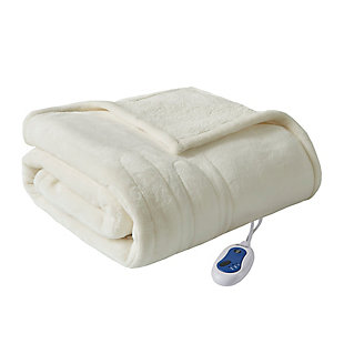Immerse yourself in comfort in the BeautyRest Heated Microlight reverse to Berber Throw. This heated throw utilizes state of the art Secure Comfort technology that adjusts the temperature of your blanket based on overall temperature, spot temperatures and the ambient temperature of your room, ensuring a consistent flow of warmth. This unique technology also emits virtually no electromagnetic field emissions, so you can snuggle up with confidence. This throw is oversized, nearly a foot larger in the length and width compared to standard heated throws. The ultra soft microlight plush fabric combines with billowy berber in this cozy, comfortable throw. Features 3 heat settings and 2 hour auto shut off. This throw is machine washable for easy care. Includes manufacturer’s 5-year warranty.Imported | Heated | Emits virtually no electromagnetic field emissions | Oversized 60x70" | 3 heat settings | Ultra soft plush | Cozy berber reverse | Machine washable | Includes manufacturer’s 5-year warranty