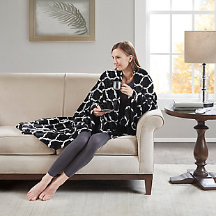 Our heated throw utilizes state of the art Secure Comfort heated technology that adjusts the temperature of your throw based on overall temperature, spot temperatures and the ambient temperature of your room, ensuring a consistent flow of warmth. This unique technology also emits virtually no EMF emissions, so you can snuggle up with confidence. This throw is oversized, nearly a foot larger in the length and width compared to standard heated throws. The ultra soft microlight plush fabric creates a cozy, comfortable throw.It features 3 heat settings and 2 hour auto shut off. This throw is machine washable for easy care.Includes manufacturer’s 5-year warranty.Imported | Heated | Emits virtually no electromagnetic field emissions | Oversized | 3 heat settings | Ultra soft plush | Soft flexible wires | 2 hour auto shut off | Twin and full size have 1 controller, queen and king have 2 controllers | Machine washable | Includes manufacturer’s 5-year warranty.