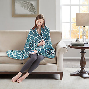 Our heated throw utilizes state of the art Secure Comfort heated technology that adjusts the temperature of your throw based on overall temperature, spot temperatures and the ambient temperature of your room, ensuring a consistent flow of warmth. This unique technology also emits virtually no electromagnetic field emissions, so you can snuggle up with confidence. This throw is oversized, nearly a foot larger in the length and width compared to standard heated throws. The ultra soft microlight plush fabric creates a cozy, comfortable throw.It features 3 heat settings and 2 hour auto shut off. This throw is machine washable for easy care.Includes manufacturer’s 5-year warranty.Imported | Virtually no electro magnetic field emissions | 3 heat settings | 2 hour auto shut off | Oversized | Machine washable | Ogee pattern | Includes manufacturer’s 5-year warranty.