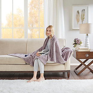 Our heated throw utilizes state of the art Secure Comfort heated technology that adjusts the temperature of your throw based on overall temperature, spot temperatures and the ambient temperature of your room, ensuring a consistent flow of warmth. This unique technology also emits virtually no EMF emissions, so you can snuggle up with confidence. This throw is oversized, nearly a foot larger in the length and width compared to standard heated throws. The ultra soft microlight plush fabric creates a cozy, comfortable throw.It features 3 heat settings and 2 hour auto shut off. This throw is machine washable for easy care.Includes manufacturer’s 5-year warranty.Imported | Heated | Emits virtually no electromagnetic field emissions | Oversized 60"x70" throw | 3 heat settings | Ultra soft plush | Soft flexible wires | 2 hour auto shut off | Machine washable | Includes manufacturer’s 5-year warranty.
