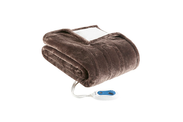 Our heated snuggle wrap utilizes state of the art Secure Comfort heated technology that adjusts the temperature of your throw based on overall temperature, spot temperatures and the ambient temperature of your room, ensuring a consistent flow of warmth. This unique technology also emits virtually no electromagnetic field emissions, so you can snuggle up with confidence. The ultra soft plush fabric and lofty berber on the reverse creates a cozy, comfortable wrap. Featuring 3 heat settings, this snuggle wrap is machine washable for easy care.Imported | Virtually no electromagnetic field emissions | Oversized 50x64" | 3 heat settings | 100% polyester | Ultra soft plush | Cozy berber reverse | Machine wash