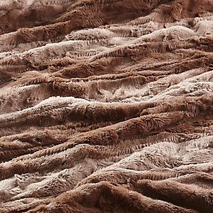 Our heated throw utilizes state of the art Secure Comfort heated technology that adjusts the temperature of your throw based on overall temperature, spot temperatures and the ambient temperature of your room, ensuring a consistent flow of warmth. This unique technology also emits virtually no electromagnetic field emissions, so you can snuggle up with confidence. This throw is oversized, nearly a foot larger in the length and width compared to standard heated throws. The ultra soft faux fur creates a cozy, comfortable throw. Featuring 3 heat settings, this throw is machine washable for easy care. Includes manufacturer’s 5-year warranty.Imported | Virtually no electromagnetic field emissions | Oversized 50"x70" | 3 heat settings | 2 hour auto shut off | 100% polyester | Ultra soft faux fur | Secure comfort heated technology | Machine wash | Includes manufacturer’s 5-year warranty
