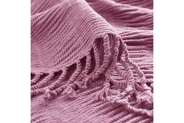 This soft acrylic throw features all over ruching for added texture and dimension. It's accented with a 2 inch fringe.Imported | Ruched design | 2" fringe | Machine washable