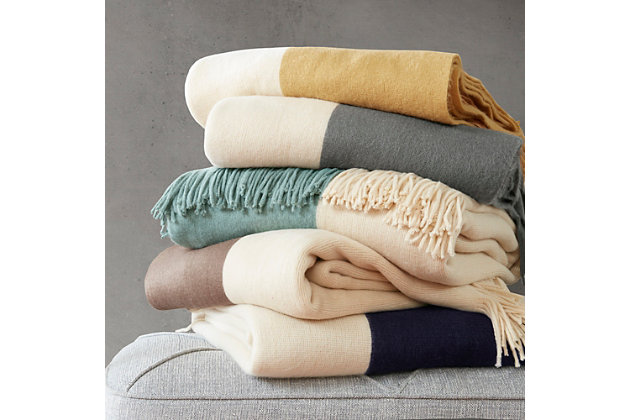 Add a layer of coziness to your room with the super soft INK+IVY Stockholm Throw. The colorblock design and fringed edges create a fun casual look.Imported