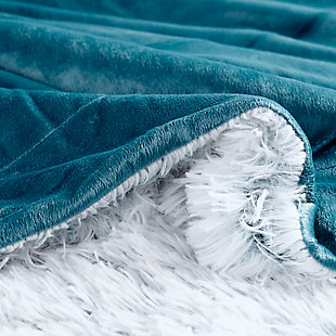 Irresistibly soft, the Intelligent Design Emma Shaggy Faux Fur Throw provides a fun and fashionable update to your space. The face of the throw flaunts reverse print or frosty print technique on extra-long faux fur that adds a frosty touch, while the solid teal faux mink on reverse creates an ultra-soft hand feel. Machine washable for easy care, this shaggy faux fur throw offers superior comfort and style to deck out your room.Imported | Irresistibly soft frosty print shaggy faux fur throw reverses to solid faux mink throw | Throw dimension 50x60 | Perfect to use it on the couch, layer on top of bed | Machine washable for easy care