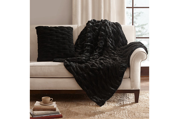 The Ruched Fur Square pillow features the softness of faux fur and reverses to an ultra soft solid lux microfur. The simple ruched pattern is the perfect sophisticated update.Imported