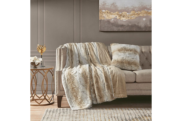 The Madison Park Zuri Square Pillow features a luxuriously soft faux fur and reverses to a solid lux microfur. This faux fur pillow is the perfect modern update and adds a glamorous accent to your home.Imported | Faux fur toss pillow 20"x20" | Hypoallergenic polyester filling | Soft and trendy | Spot clean only