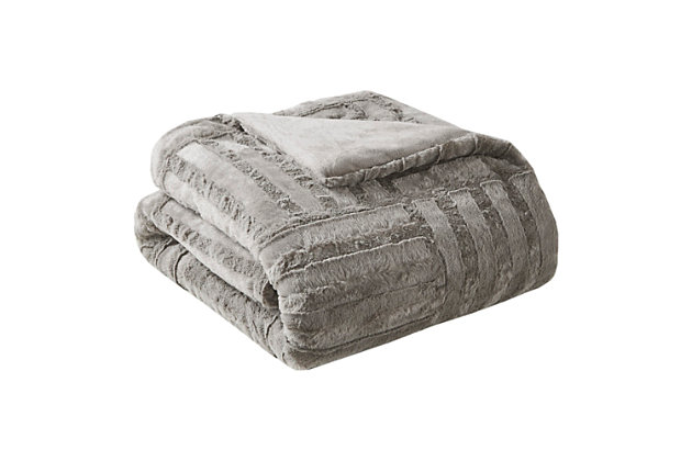 Keep yourself warm and cozy with the Arctic plush throw. The ultra plush fabric is incredibly soft and features a checkboard design for added texture and dimension.Imported | Ultra soft plush fabric | Checkboard pattern | 50x60" | Down alternative filling | Machine wash