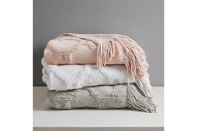 Add a cozy farmhouse touch to your home with the Madison Park Brianne Cotton Tufted Throw. This ivory cotton throw flaunts a tufted geometric pattern with a 4-inch fringe on each end that adds texture and dimension, for a charming country allure. The 100% cotton fabric creates a lightweight and natural feel, making this cottage throw perfect for all seasons. Machine washable for easy care, this cotton tufted throw is great as a layering piece across your bed or can be hung like a tapestry for a chic accent on your wall.Imported | 100% cotton tufted throw | 4" fringe | Natural cotton feel | Machine washable