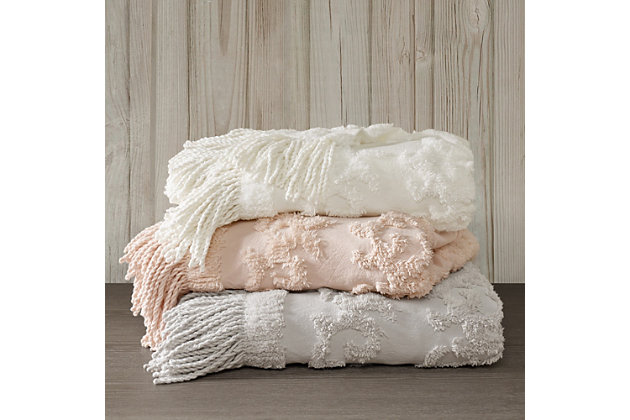 The Madison Park Chloe Cotton Tufted Throw provides a luxurious addition to your home decor. This blush throw flaunts an elegant tufted chenille design with a 4-inch fringe on each end, for a beautiful bohemian look. The ultra-soft 100% cotton construction creates a light natural feel that’s perfect for all seasons. Machine washable, this cotton tufted throw is great for layering across your bed or for simply bundling up in to stay warm and cozy.Imported | 100% cotton tufted chenille throw | 4" fringe | Ultra soft | Machine washable