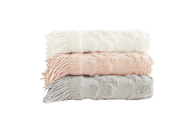 The Madison Park Chloe Cotton Tufted Throw provides a luxurious addition to your home decor. This grey throw flaunts an elegant tufted chenille design with a 4-inch fringe on each end, for a beautiful bohemian look. The ultra-soft 100% cotton construction creates a light natural feel that’s perfect for all seasons. Machine washable, this cotton tufted throw is great for layering across your bed or for simply bundling up in to stay warm and cozy.Imported | 100% cotton tufted chenille throw | 4" fringe | Ultra soft | Machine washable