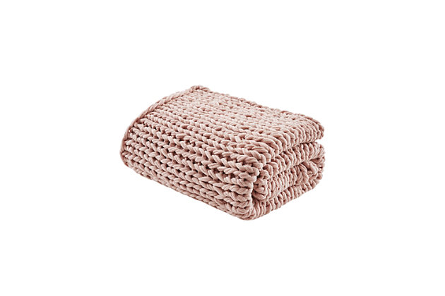 Get warm and cozy with the Madison Park Chunky Double Knit Handmade Throw. This handmade blush chunky cable knit throw is double-knitted for durability and an incredible soft-hand feel. The hand-knit throw has a lovely ribbon tied around it, making it a thoughtful gift. Soft and cozy, this handmade knit throw is perfect to snuggle up in and offers a shabby chic addition to your home. Spot clean or hand wash only.Imported | Comfy hand knit throw | Double knitted for duarbility | Soft hand feel | Giftable - ribbon tied for easy gifting | Spot clean or hand wash