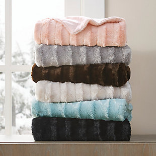 Bundle up in the lush comfort of the Madison Park Duke Long Fur Throw. This ultra-soft plush throw provides exceptional warmth and comfort, while a micro fur reverse adds extra softness to the design. Layer the throw blanket on your bed to keep yourself warm on cold nights or lay it across your sofa for a decorative piece. This throw is machine washable for easy care.Imported | Ultra soft plush | 50"x60" | Machine wash