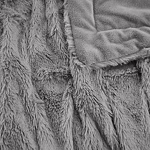 The Luxury Ruched Fur Throw features the softness of faux fur and reverses to an ultra soft solid faux mink. The simple hand ruched pattern is the perfect sophisticated update.Imported | Luxury hand ruched faux fur throw | Reverse is ultra soft faux mink, choose your side to cuddle | Throw dimensions 50”x60” | Machine washable for easy care
