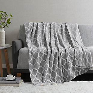 This Madison Park super soft microlight oversized plush throw features a modern ogee print that adds style and flair to any room. MicroLight is the next generation in plush throws. Our unique knitting technology allows us to craft an irresistibly soft, ultra lofty throw that is light enough to be used during even the warmest summer months and is perfect as a layering piece during the coldest of winters. It's machine washable for easy care.Imported | Super soft microlight plush throw | Modern ogee print adds style and flair to any room | Oversized dimensions 60x70" | Machine washable for easy care