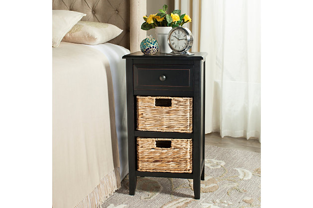 Stow in love. Need a bit of extra storage? You’re sure to find the Everly side table in distressed black an absolute essential. A highly functional bedroom nightstand, it’s also a handy addition in the kids room, family room or home office. Pair of included rattan baskets add a casually cool element.Made of pine wood | Distressed black finish | 1 smooth-gliding drawer | 2 rattan baskets with cutout handles