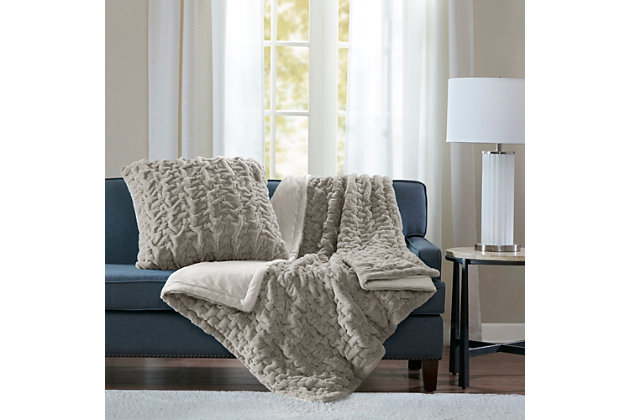 Add a modern and sophisticated throw to any space with the Madison Park Ruched Fur throw. The throw features an ultra soft long fur that will keep you warm and cozy.Imported | Ruched pattern | Ultra soft long fur | 50x60" | Machine wash