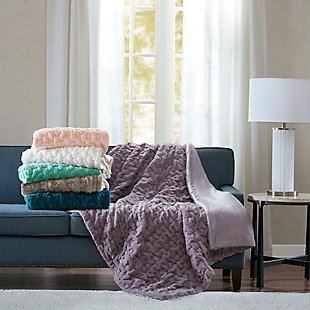 Add a modern and sophisticated throw to any space with the Madison Park Ruched Fur throw. The throw features an ultra soft long fur that will keep you warm and cozy.Imported | Ruched pattern | Ultra soft long fur | 50"x60" | Machine wash