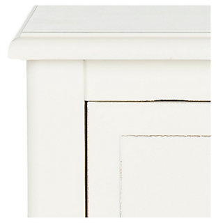 Stow in love. Need a bit of extra storage? You’re sure to find the Everly side table in distressed white an absolute essential. A highly functional bedroom nightstand, it’s also a handy addition in the kids room, family room or home office. Pair of included rattan baskets add a casually cool element.Made of pine wood | Distressed white finish | 1 smooth-gliding drawer | 2 rattan baskets with cutout handles
