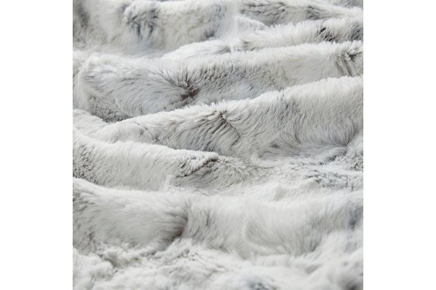 Add a glamorous accent to your home with Madison Park’s Sachi Oversized Faux Fur Throw. Exceptionally soft faux fur mimics the warmth and texture of real fur, while the marble print gives the throw a beautifully stunning look. The throw is oversized, nearly a foot larger in length and width compared to other throws. Luxuriously indulgent, this faux fur throw wraps you in irresistible softness and is machine washable for easy care.Imported | Marble print long faux fur throw | Oversized throw dimension 60x70 inches | Faux fur face, faux mink on reverse | Warm and stylish in any room | Machine washable