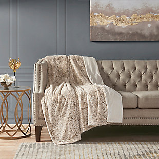 The Madison Park Zuri oversized throw features a luxuriously soft faux fur and reverses to a solid faux mink. This faux fur throw is the perfect modern update and adds a glamorous accent to your home.Imported | Oversized faux fur throw blanket | Super soft and cozy throw | Luxuriously soft faux fur face & solid faux mink reverse | Machine washable