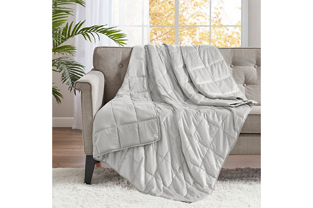 The Sleep Philosophy Mink to Microfiber Weighted Blanket offers a perfect combination of comforter and style for your home. This weighted blanket features a grey faux mink face with a solid microfiber reverse, for a soft touch. The weight of the blanket distributes a light pressure all over your body, creating the feeling of being hugged to help reduce stress and anxiety. It also helps promote a deep and restful sleep throughout the night.Imported | Weighted blanket | Distributes light pressure all over to help reduce stress and anxiety | Creates the feeling of being held or hugged for relaxation | Helps to promote a deep and restful sleep throughout the night | Choose a blanket that’s around 10% of your body weight | Available in 12 lb, 15 lb and 17 lb weights.
