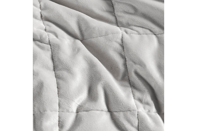 The Sleep Philosophy Mink to Microfiber Weighted Blanket offers a perfect combination of comforter and style for your home. This weighted blanket features a grey faux mink face with a solid microfiber reverse, for a soft touch. The weight of the blanket distributes a light pressure all over your body, creating the feeling of being hugged to help reduce stress and anxiety. It also helps promote a deep and restful sleep throughout the night.Imported | Weighted blanket | Distributes light pressure all over to help reduce stress and anxiety | Creates the feeling of being held or hugged for relaxation | Helps to promote a deep and restful sleep throughout the night | Choose a blanket that’s around 10% of your body weight | Available in 12 lb, 15 lb and 17 lb weights.