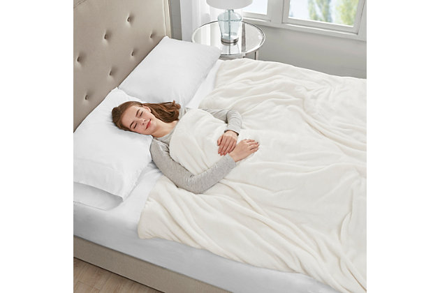 The Sleep Philosophy plush weighted blanket is a safe and effective remedy for anyone looking for a better night’s sleep or just to feel a little more relaxed after a stressful day at the office. The 60”x70” blanket distributes pressure all over your body, touching pressure points that can help reduce stress and anxiety. At the same time it creates a feeling of being held or hugged to make you feel secure and relaxed. The weighted insert is box-sewn to prevent the poly and glass bead filling from shifting during use. There are 10 ties inside the plush cover to secure the insert in place. Using a weighted blanket can help relax user's mind and in turn promote a deep and restful sleep throughout the night. This blanket can be used in many different ways by covering your whole body for sleep or simply wrap it around your shoulders or lay it across your lap or legs. Choose a blanket that’s around 10% of your body weight, available in 12, 18, or 25 pound size. The plush cover with a zipper closure is removable for easy machine washing.Imported | Provides all over body comforting pressure, making you feel secure and relaxed | Weighted blanket designed for adults or minimum body weight of 120 lbs or more | Poly fill and glass beads filling weight to promote a deep and restful sleep throughout the night | Removable plush cover zipper closure is machine washable for easy care | 10 inside ties efficiently stay put the weighted insert | Available in 12 lb, 18 lb, and 25lb weights