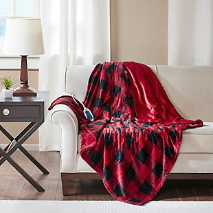 Cozy up in the True North by Sleep Philosophy heated throw. It features Secure Comfort heated technology that adjusts the temperature of your throw based on overall temperature, spot temperatures and the ambient temperature of your room, ensuring a consistent flow of warmth. This unique technology also emits virtually no electromagnetic field emissions. This throw is oversized, nearly a foot larger in the length and width compared to standard heated throws. The ultra soft microlight plush fabric creates a cozy, comfortable throw. The throw has 3 heat settings and 2 hour auto shut off. It's machine washable for easy care. Includes manufacturer’s 5-year warranty.Imported | Heated | Emits virtually no electromagnetic field emissions | Oversized | 3 heat settings | Ultra soft plush | Soft flexible wires | 2 hour auto shut off | Machine washable | Includes manufacturer’s 5-year warranty