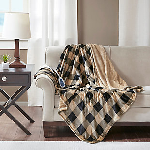Cozy up in the True North by Sleep Philosophy heated throw. It features Secure Comfort heated technology that adjusts the temperature of your throw based on overall temperature, spot temperatures and the ambient temperature of your room, ensuring a consistent flow of warmth. This unique technology also emits virtually no electromagnetic field emissions. This throw is oversized, nearly a foot larger in the length and width compared to standard heated throws. The ultra soft microlight plush fabric creates a cozy, comfortable throw. The throw has 3 heat settings and 2 hour auto shut off. It's machine washable for easy care. Includes manufacturer’s 5-year warranty.Imported | Heated | Emits virtually no electromagnetic field emissions | Oversized | 3 heat settings | Ultra soft plush | Soft flexible wires | 2 hour auto shut off | Machine washable | Includes manufacturer’s 5-year warranty