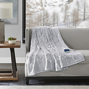 True North by Sleep Philosophy offers incredible comfort and style with the Raina Heated Metallic Print Throw. A silver metallic geometric design is beautifully printed on an ultra-soft plush grey base fabric. Emitting virtually no electromagnetic field emissions, this throw features three heat settings and a 2-hour shut-off timer to provide the perfect amount of warmth and comfort. Bundle up in comfort and add a casual touch with a glamorous flair to your home with this heated metallic print throw. Includes manufacturer’s 5-year warranty.Imported | Virtually no electromagnetic field emissions | 3 heat settings | 2 hour auto shut off | Ultra soft plush | 5 year warranty | Machine wash | Includes manufacturer’s 5-year warranty