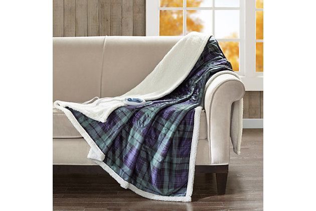 The Woolrich heated throw utilizes state of the art Secure Comfort heated technology that adjusts the temperature of your throw based on overall temperature, spot temperatures and the ambient temperature of your room, ensuring a consistent flow of warmth. This unique technology also emits virtually no electromagnetic field emissions, so you can snuggle up with confidence. This throw is oversized, nearly a foot larger in the length and width compared to standard heated throws. The ultra soft plush fabric and the lofty berber reverse creates a cozy, comfortable throw. Featuring 3 heat settings, this throw is machine washable for easy care. Includes manufacturer’s 5-year warranty.Imported | Virtually no electro magnetic field emissions | 3 heat settings | 2 hour auto shut off | Oversized | Machine washable | Plaid pattern | Ultra soft plush fabric | Cozy berber reverse | Includes manufacturer’s 5-year warranty