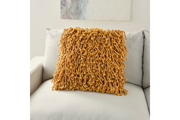 Enjoy the fun and funky texture of this shag throw pillow from mina victory home accents on your couch, chair or other seating area. Its retro-inspired design features thickly knotted yarns in a bold yellow tone that demands attention. The accent pillow is handmade from a blend of polyester and cotton, with a comfy polyfill insert and zipper closure.Handmade from polyester and cotton | Soft polyfill insert | Thickly knotted yarns | Zipper closure | Imported