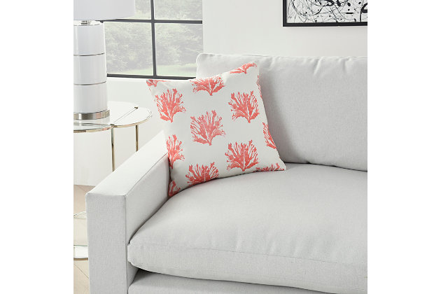 Add coastal charm to your patio furniture with this reversible indoor/outdoor throw pillow from mina victory home accents. A repeat pattern of coral adorns its face in this artistic interpretation of underwater life. Handmade in coral pink and ivory, it reverses to a vibrantly scalloped drop pattern for double the design power. The accent pillow includes a soft polyfill insert and zipper closure.Handcrafted from 100% polyester | Soft polyfill insert | Indoor/outdoor | Reverses to wavy scalloped drop pattern | Spot clean | Zipper closure | Imported