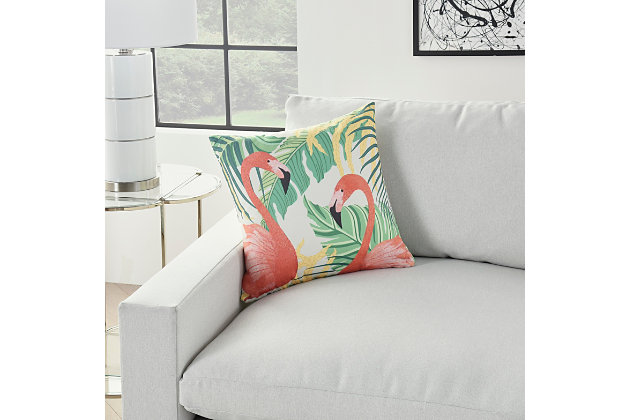 Deliver a touch of the tropics straight to your patio, porch, or deck with this colorful indoor/outdoor throw pillow from mina victory home accents. This handmade pillow features two flamingos standing tall against a backdrop of banana leaves. It reverses to a modern botanical pattern so you can double your design possibilities. The accent pillow includes a soft polyfill insert and zipper closure.Handcrafted from 100% polyester | Soft polyfill insert | Indoor/outdoor | Reverses to modern botanical pattern | Spot clean | Zipper closure | Imported