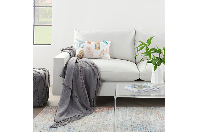 Handmade of soft cotton fibers with a thickly tufted abstract diamond pattern, this gray mina victory throw blanket is a sophisticated accent piece that you’ll love to drape around you on chilly nights. Sized right for cuddling, it coordinates beautifully with the matching throw pillow and pouf.Handcrafted from 100% cotton | Thickly tufted abstract diamond pattern | Sophisticated accent piece | Imported