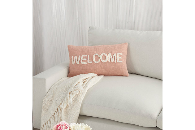 Add a cozy note of welcome with this decorative throw pillow from mina victory home accents. It’s handmade with a softly tufted word graphic on a textured cotton cover, and filled to perfect plumpness. This playful pillow, crafted in blush pink with white embellishment, includes a zipper closure with soft polyfill insert.Handcrafted from 100% cotton | Soft polyfill | Softly tufted lettering | Zipper closure | Spot clean | Imported