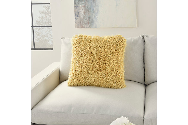 Made for cuddling, this groovy shag throw pillow from mina victory home accents adds mod style to your living room or bedroom. Easy to coordinate with in a solid yellow tone, its plush face combines nubby, boucle-style fibers and strings of yarn for a fun textural feel. This contemporary design is crafted from polyester with a soft polyfill insert. Pattern appears on face only.Made of 100% polyester | Soft polyfill insert | Plush yarn shag face | Zipper closure | Pattern appears on face only | Imported