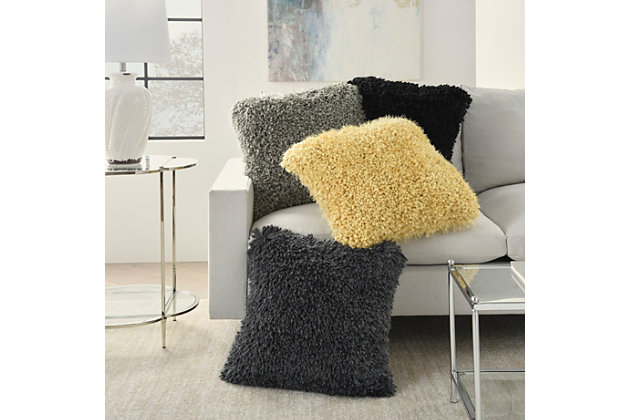 Made for cuddling, this groovy shag throw pillow from mina victory home accents adds mod style to your living room or bedroom. Easy to coordinate with in a solid yellow tone, its plush face combines nubby, boucle-style fibers and strings of yarn for a fun textural feel. This contemporary design is crafted from polyester with a soft polyfill insert. Pattern appears on face only.Made of 100% polyester | Soft polyfill insert | Plush yarn shag face | Zipper closure | Pattern appears on face only | Imported