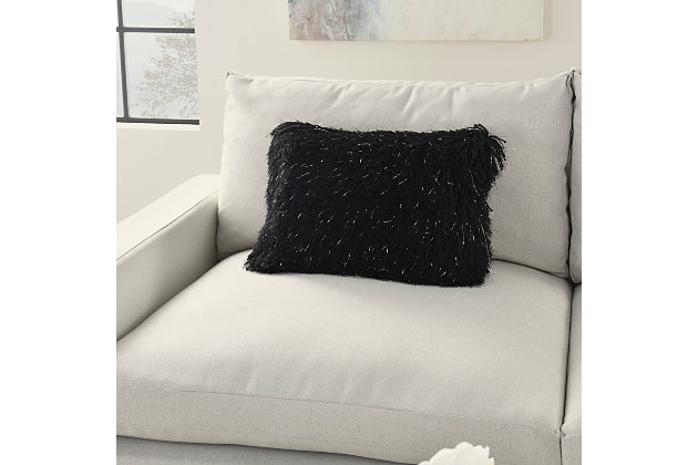 Snuggle up to the comfy, ultra-plush texture of this groovy oblong shag throw pillow from mina victory home accents. With a perfectly simple, fuzzy front and velvety soft back in black, it adds just the right mix of functionality and style. Strips of slender, shimmering yarns add a delicate sheen to its modern design. Includes a cozy polyester insert and zipper closure.Made of 100% polyester | Soft polyfill insert | Plush yarn shag face | Reverses to soft back | Zipper closure | Imported