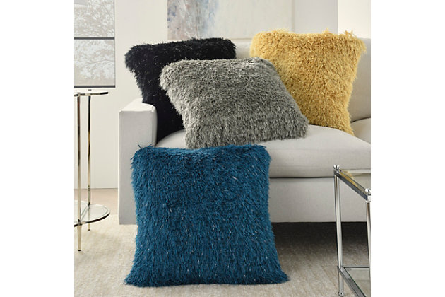 Snuggle up to the comfy, ultra-plush texture of this groovy shag throw pillow from mina victory home accents. With a perfectly simple, fuzzy front and velvety soft back in teal blue, it adds just the right mix of functionality and style. Strips of slender, shimmering yarns add a delicate sheen to its modern design. Includes a cozy polyester insert and zipper closure.Made of 100% polyester | Soft polyfill insert | Plush yarn shag face | Reverses to soft back | Zipper closure | Imported