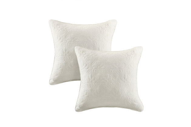 With a refreshing take on texture, the Quebec Quilted Square Pillow Set in a soft ivory is the perfect touch. Its classic stitch pattern pairs easily with your existing decor and is sure to add a charming new element to your space. Measuring 20 inches by 20 inches, these square pillows feature a solid reverse, piping detail and soft polyester fill for simple comfort.Set of 2  | Made with polyester microfiber in soft ivory | Soft polyfill | Quilted in a classic stitch pattern  | Solid reverse | Piping detail around the edges | Coordinates with the matching coverlet quilt Collection (sold separately)  | Imported | Spot clean only