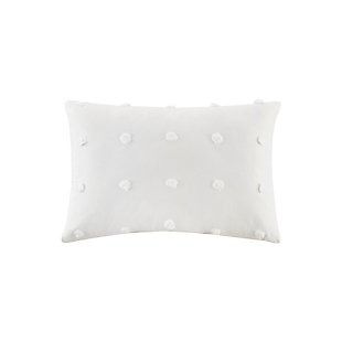 It's all in the details with the cool and chic Urban Habitat Brooklyn Pom-Pom Oblong Pillow. This solid ivory decorative pillow features , allover pom-pom tufts, creating a beautiful texture and fresh tonal pattern. The cotton cover provides a natural touch for a casual and modern update, ma this pillow a stylish addition to any space. Complete the look with coordinating valance, panel curtains and bedding. Made with cotton jacquard | Soft polyfill | Allover pom-pom tufts | Removable cover with hidden zipper closure | OEKO-TEX® Certified, includes no harmful substances or chemicals | Coordinating bedding, panel curtains, and valance available; sold separately | Imported | Machine washable