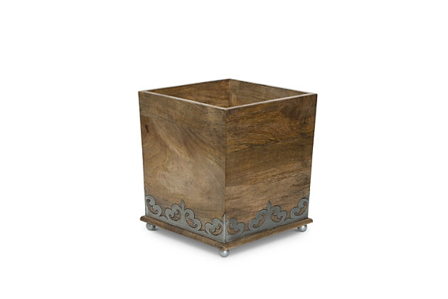 Complete your bathroom decor with this wonderfully unique bathroom accessory. This wooden waste basket is handcrafted in a medium brown and finely grained, and also comes with scrolled metal inlays. The classic European style makes a stunning addition to a master or guest bathroom and is an exceptionally attractive way to stash your trash.Made of wood and aluminum | Medium brown finish with fine wood grain | Hand-crafted metal feet keeps box elevated