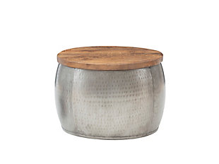 This hammered metal storage drum is a unique piece that will add a touch of elegance to your home. The lustrous silver color and rich solid wood lid infuse rich texture, functional storage and worldly elegance into your home. Handcrafted in India, this is a wonderful accent piece that can be used both as a small table and for extra storage. The lid lifts off to reveal hidden storage, perfect for extra blankets, pillows or rogue remote controls.Hammered iron drum with silver finish | Lift off solid distressed Mango wood top | Spacious internal storage | Handcrafted in India | No assembly required | Perfect accent for any home decor | Roomy storage for just about anything | Tabletop diameter of 22.5 inches
